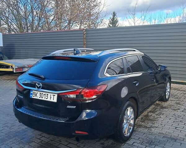 Чорний Мазда 6, об'ємом двигуна 2.19 л та пробігом 218 тис. км за 9000 $, фото 4 на Automoto.ua