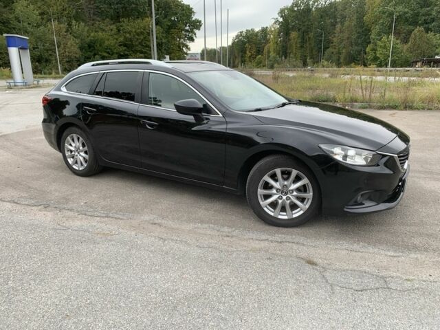 Черный Мазда 6, объемом двигателя 2.2 л и пробегом 259 тыс. км за 9700 $, фото 2 на Automoto.ua