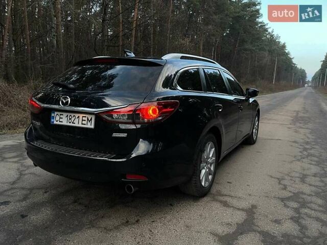 Черный Мазда 6, объемом двигателя 2.18 л и пробегом 195 тыс. км за 9500 $, фото 5 на Automoto.ua