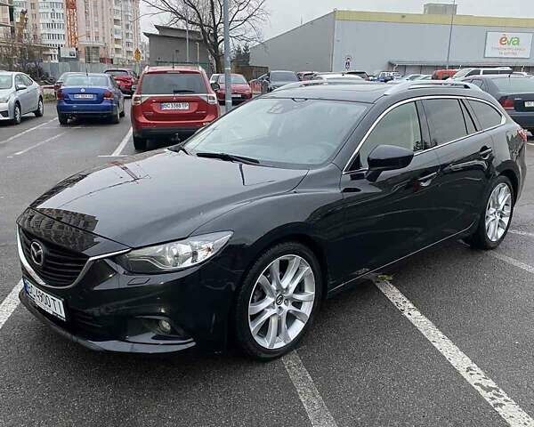 Черный Мазда 6, объемом двигателя 2.19 л и пробегом 300 тыс. км за 12200 $, фото 1 на Automoto.ua