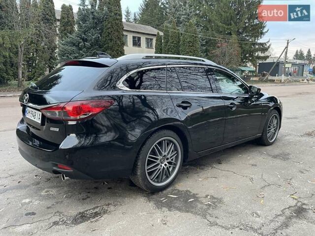 Черный Мазда 6, объемом двигателя 2.18 л и пробегом 175 тыс. км за 11000 $, фото 9 на Automoto.ua