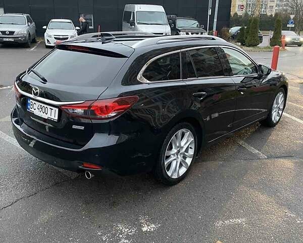 Черный Мазда 6, объемом двигателя 2.19 л и пробегом 300 тыс. км за 12200 $, фото 3 на Automoto.ua