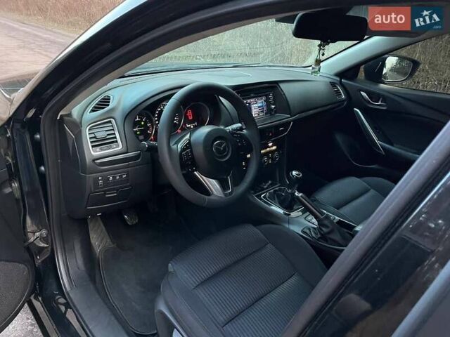 Черный Мазда 6, объемом двигателя 2.18 л и пробегом 195 тыс. км за 9500 $, фото 7 на Automoto.ua