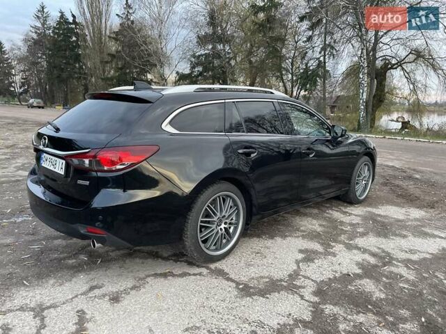 Черный Мазда 6, объемом двигателя 2.18 л и пробегом 175 тыс. км за 11000 $, фото 10 на Automoto.ua