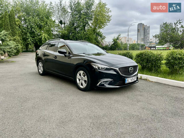 Черный Мазда 6, объемом двигателя 2.18 л и пробегом 247 тыс. км за 13400 $, фото 2 на Automoto.ua