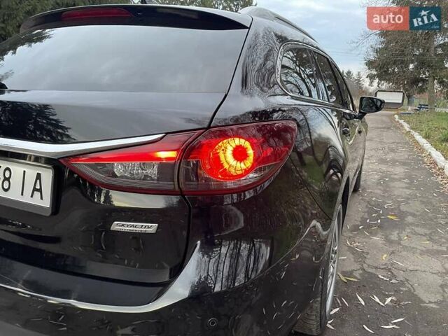 Черный Мазда 6, объемом двигателя 2.18 л и пробегом 175 тыс. км за 11000 $, фото 33 на Automoto.ua