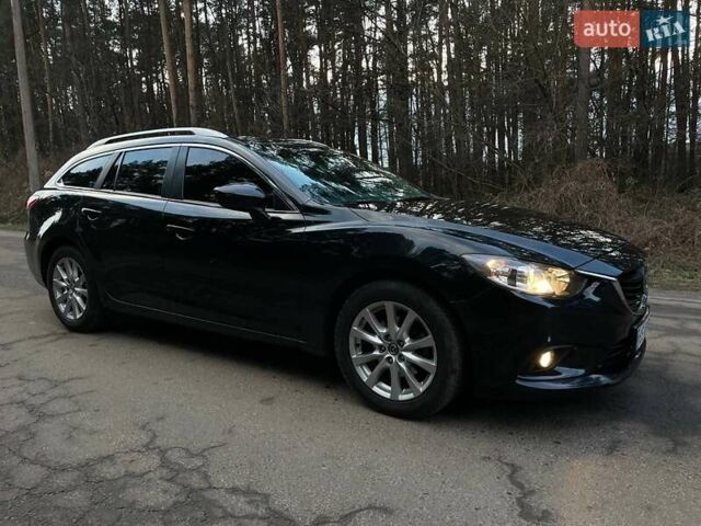 Черный Мазда 6, объемом двигателя 2.18 л и пробегом 195 тыс. км за 9500 $, фото 3 на Automoto.ua