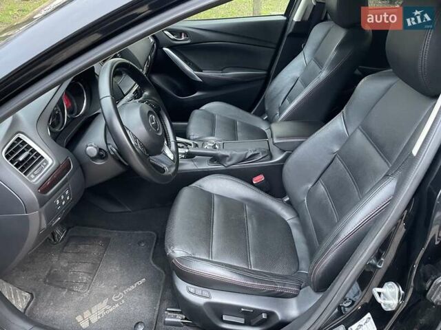 Черный Мазда 6, объемом двигателя 2.18 л и пробегом 175 тыс. км за 11000 $, фото 18 на Automoto.ua