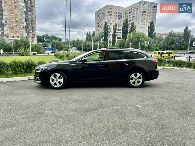 Черный Мазда 6, объемом двигателя 2.18 л и пробегом 247 тыс. км за 13400 $, фото 10 на Automoto.ua