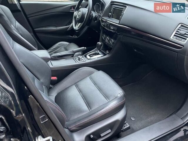 Черный Мазда 6, объемом двигателя 2.18 л и пробегом 175 тыс. км за 11000 $, фото 19 на Automoto.ua