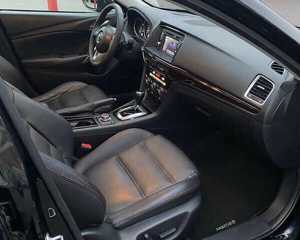 Черный Мазда 6, объемом двигателя 2.19 л и пробегом 300 тыс. км за 12200 $, фото 9 на Automoto.ua
