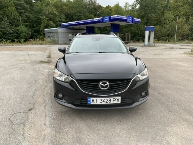 Черный Мазда 6, объемом двигателя 2.2 л и пробегом 259 тыс. км за 9700 $, фото 1 на Automoto.ua
