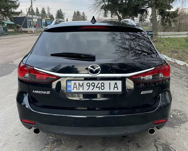 Черный Мазда 6, объемом двигателя 2.18 л и пробегом 175 тыс. км за 11000 $, фото 8 на Automoto.ua
