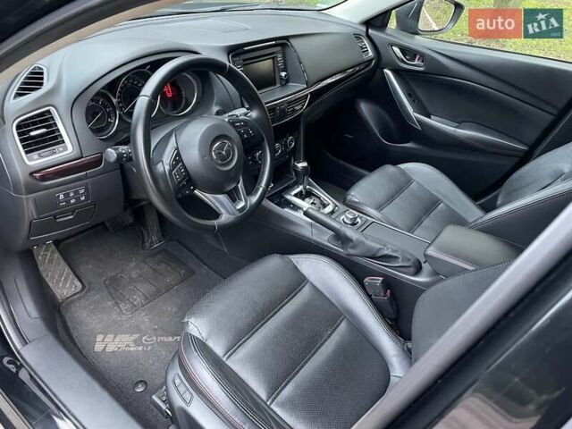 Черный Мазда 6, объемом двигателя 2.18 л и пробегом 175 тыс. км за 11000 $, фото 17 на Automoto.ua