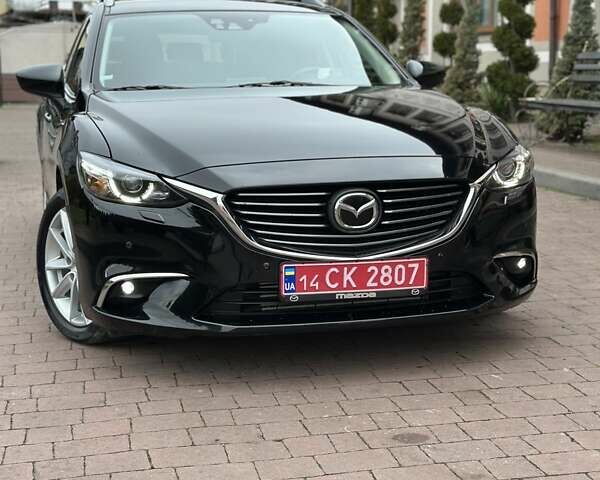 Черный Мазда 6, объемом двигателя 2.19 л и пробегом 177 тыс. км за 15550 $, фото 6 на Automoto.ua