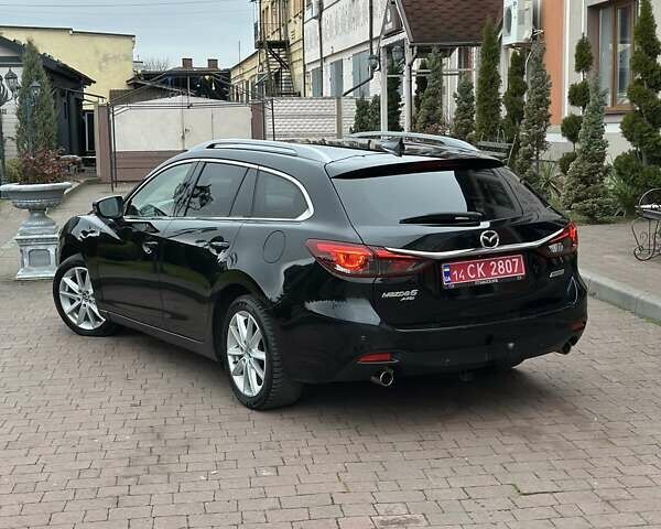 Черный Мазда 6, объемом двигателя 2.19 л и пробегом 177 тыс. км за 15550 $, фото 18 на Automoto.ua