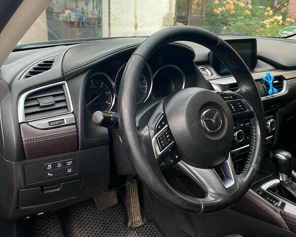 Черный Мазда 6, объемом двигателя 2.19 л и пробегом 270 тыс. км за 11100 $, фото 16 на Automoto.ua