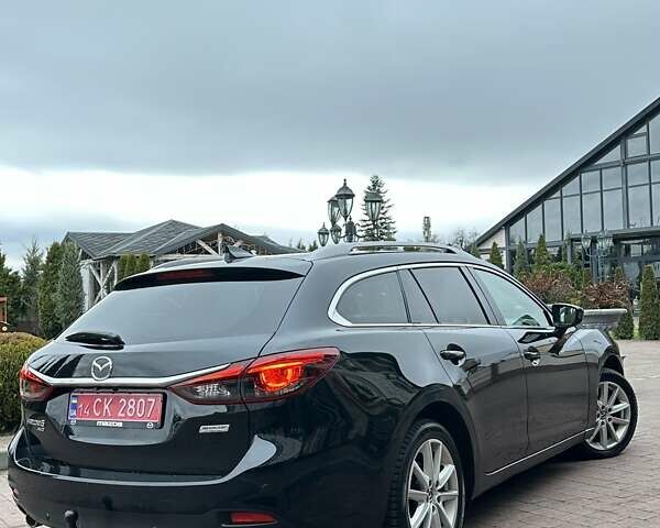 Черный Мазда 6, объемом двигателя 2.19 л и пробегом 177 тыс. км за 15550 $, фото 30 на Automoto.ua