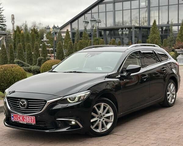 Черный Мазда 6, объемом двигателя 2.19 л и пробегом 177 тыс. км за 15550 $, фото 11 на Automoto.ua