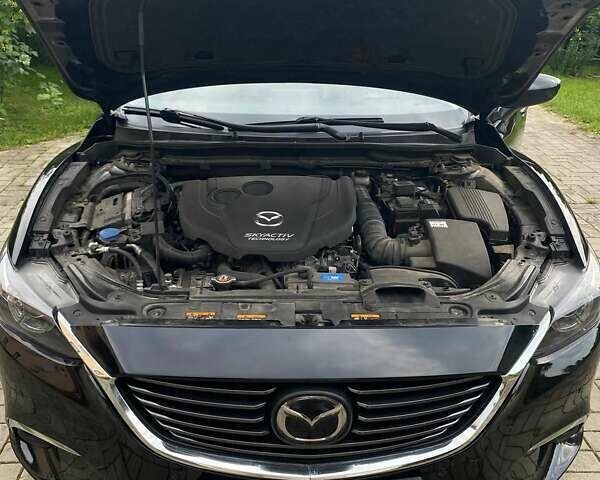 Черный Мазда 6, объемом двигателя 2.19 л и пробегом 270 тыс. км за 11100 $, фото 7 на Automoto.ua