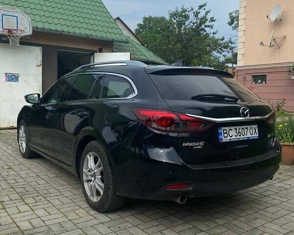Черный Мазда 6, объемом двигателя 2.19 л и пробегом 270 тыс. км за 11100 $, фото 1 на Automoto.ua