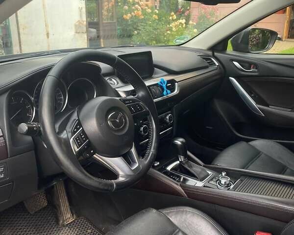 Черный Мазда 6, объемом двигателя 2.19 л и пробегом 270 тыс. км за 11100 $, фото 9 на Automoto.ua