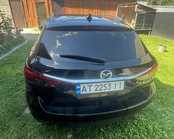 Чорний Мазда 6, об'ємом двигуна 2.19 л та пробігом 285 тис. км за 13500 $, фото 6 на Automoto.ua