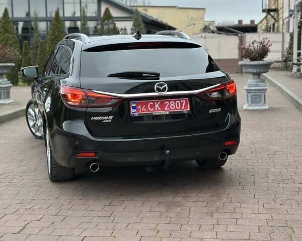 Черный Мазда 6, объемом двигателя 2.19 л и пробегом 177 тыс. км за 15550 $, фото 20 на Automoto.ua