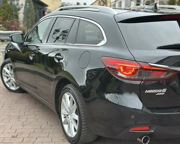 Черный Мазда 6, объемом двигателя 2.19 л и пробегом 177 тыс. км за 15550 $, фото 24 на Automoto.ua
