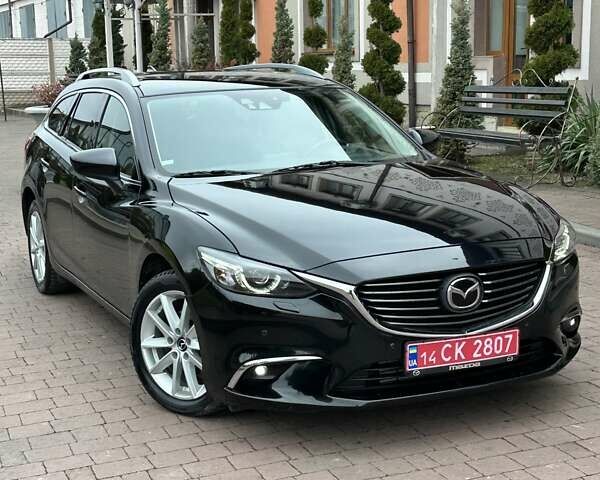 Черный Мазда 6, объемом двигателя 2.19 л и пробегом 177 тыс. км за 15550 $, фото 3 на Automoto.ua