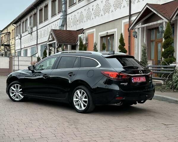 Черный Мазда 6, объемом двигателя 2.19 л и пробегом 177 тыс. км за 15550 $, фото 22 на Automoto.ua