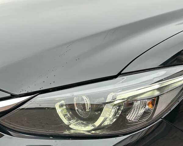 Черный Мазда 6, объемом двигателя 2.19 л и пробегом 177 тыс. км за 15550 $, фото 8 на Automoto.ua