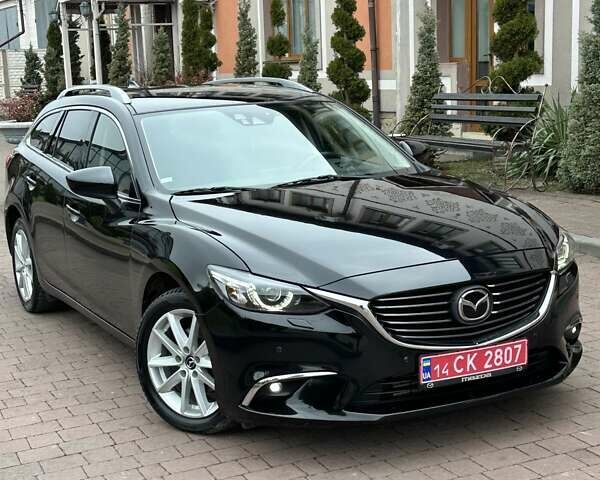 Черный Мазда 6, объемом двигателя 2.19 л и пробегом 177 тыс. км за 15550 $, фото 2 на Automoto.ua