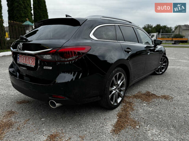 Черный Мазда 6, объемом двигателя 2.2 л и пробегом 173 тыс. км за 14200 $, фото 17 на Automoto.ua