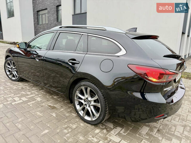 Черный Мазда 6, объемом двигателя 2.2 л и пробегом 194 тыс. км за 14799 $, фото 17 на Automoto.ua