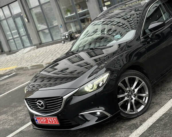 Черный Мазда 6, объемом двигателя 2.2 л и пробегом 219 тыс. км за 14200 $, фото 9 на Automoto.ua