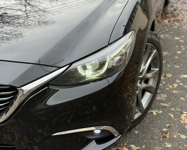 Черный Мазда 6, объемом двигателя 2.2 л и пробегом 219 тыс. км за 14200 $, фото 12 на Automoto.ua