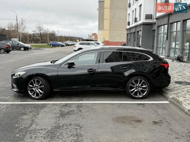 Черный Мазда 6, объемом двигателя 2.2 л и пробегом 219 тыс. км за 14200 $, фото 1 на Automoto.ua