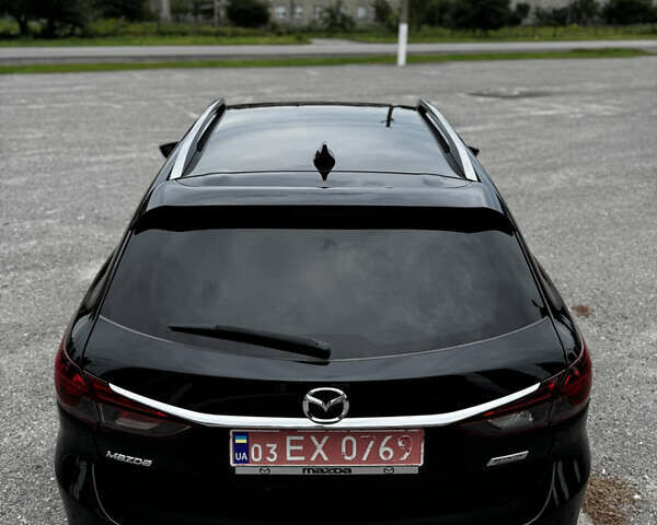 Черный Мазда 6, объемом двигателя 2.2 л и пробегом 173 тыс. км за 14600 $, фото 18 на Automoto.ua