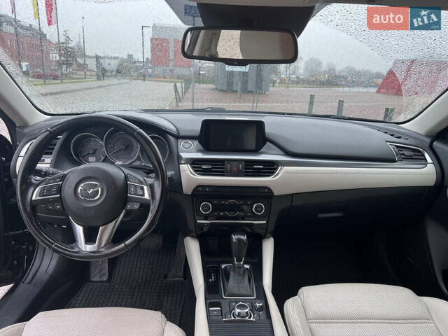 Черный Мазда 6, объемом двигателя 2.19 л и пробегом 222 тыс. км за 14200 $, фото 7 на Automoto.ua