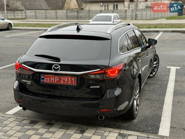 Черный Мазда 6, объемом двигателя 2.2 л и пробегом 219 тыс. км за 14200 $, фото 5 на Automoto.ua