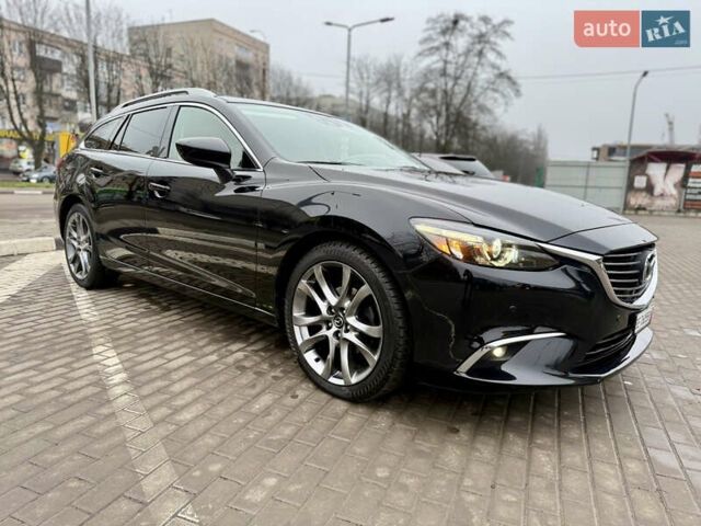 Черный Мазда 6, объемом двигателя 2.2 л и пробегом 194 тыс. км за 14799 $, фото 9 на Automoto.ua