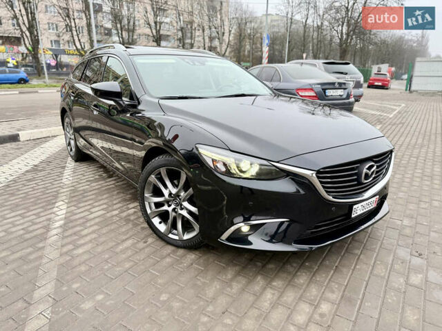 Черный Мазда 6, объемом двигателя 2.2 л и пробегом 194 тыс. км за 14799 $, фото 1 на Automoto.ua