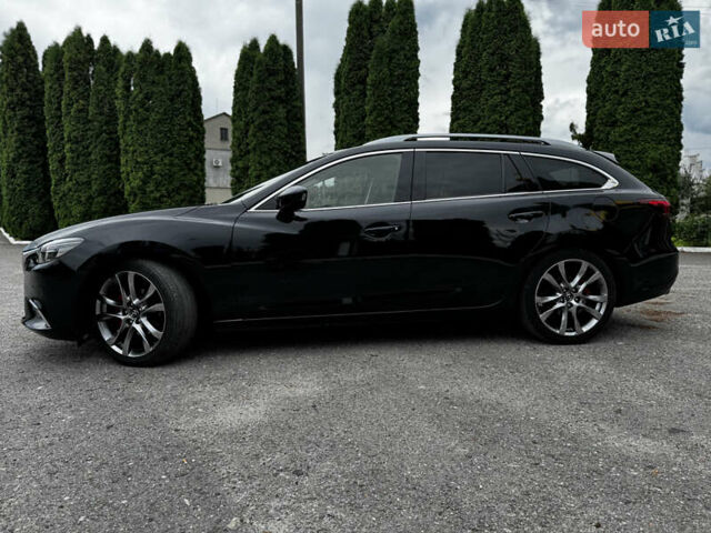 Черный Мазда 6, объемом двигателя 2.2 л и пробегом 173 тыс. км за 14600 $, фото 11 на Automoto.ua