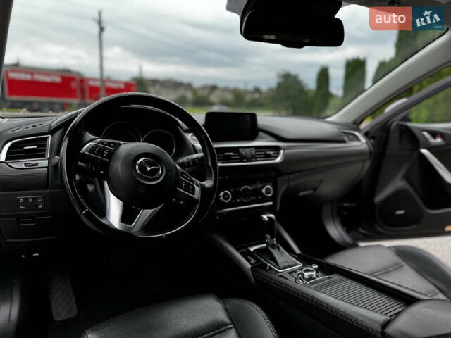 Черный Мазда 6, объемом двигателя 2.2 л и пробегом 173 тыс. км за 14600 $, фото 27 на Automoto.ua