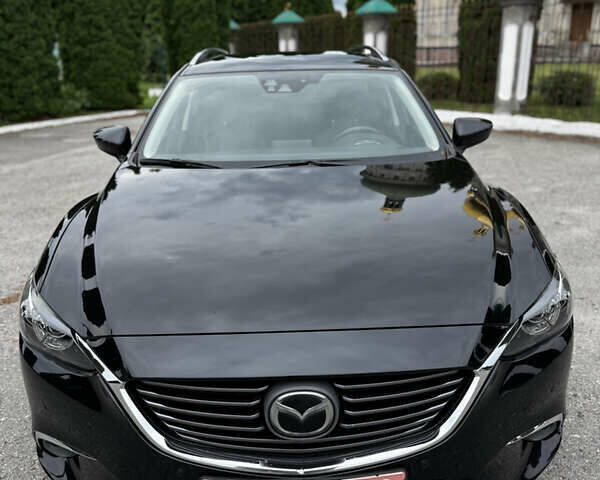 Черный Мазда 6, объемом двигателя 2.2 л и пробегом 173 тыс. км за 14600 $, фото 1 на Automoto.ua