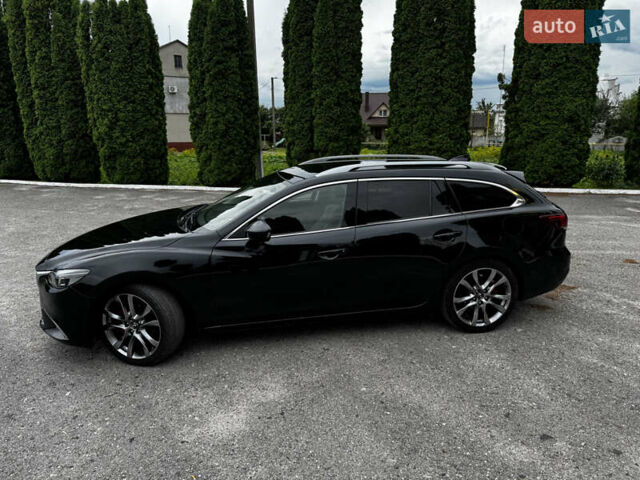 Черный Мазда 6, объемом двигателя 2.2 л и пробегом 173 тыс. км за 14600 $, фото 12 на Automoto.ua