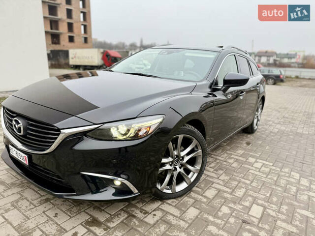 Черный Мазда 6, объемом двигателя 2.2 л и пробегом 194 тыс. км за 14799 $, фото 12 на Automoto.ua