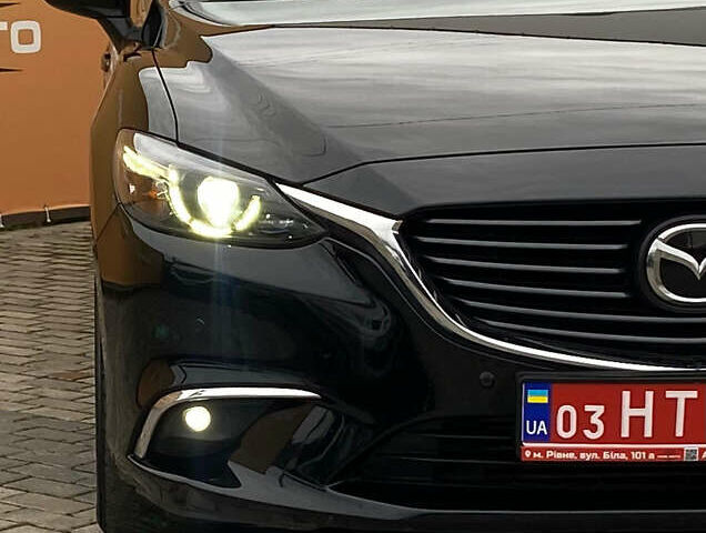 Чорний Мазда 6, об'ємом двигуна 2.2 л та пробігом 175 тис. км за 14900 $, фото 4 на Automoto.ua