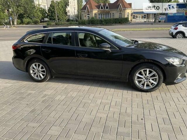 Черный Мазда 6, объемом двигателя 2.19 л и пробегом 147 тыс. км за 13500 $, фото 12 на Automoto.ua